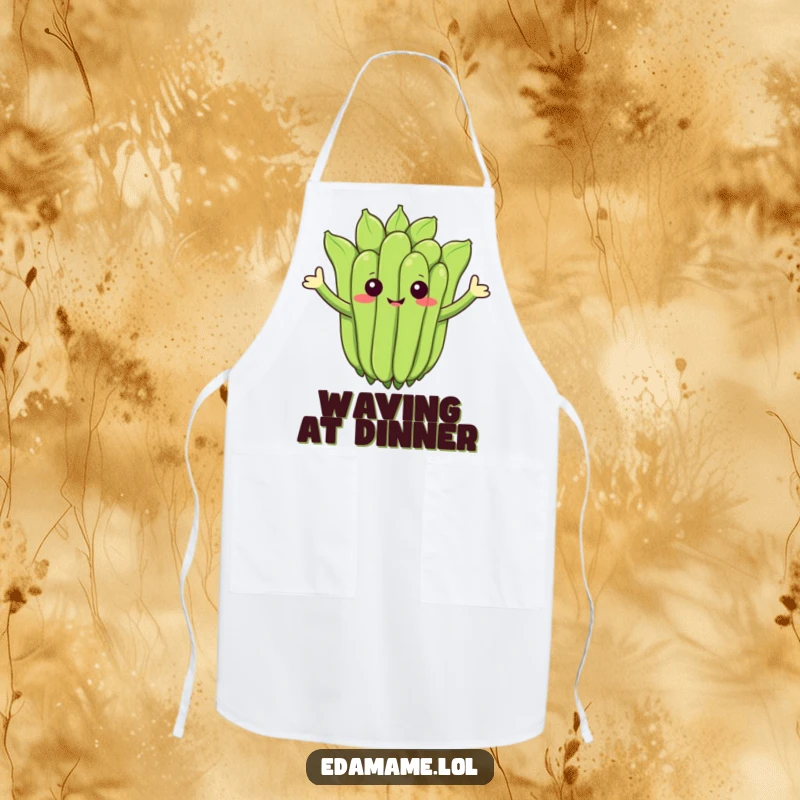 Funny apron showing a cheerful edamame cluster waving, perfect for cooking with fun.