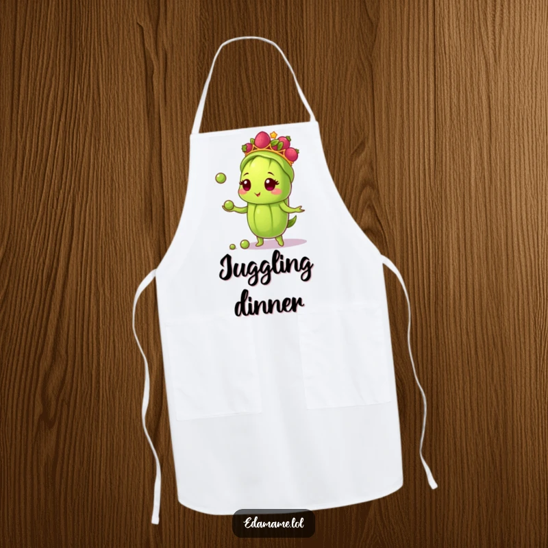 Funny apron featuring an edamame pod wearing a berry tiara, juggling peas, perfect for adding fun and protection in the kitchen.