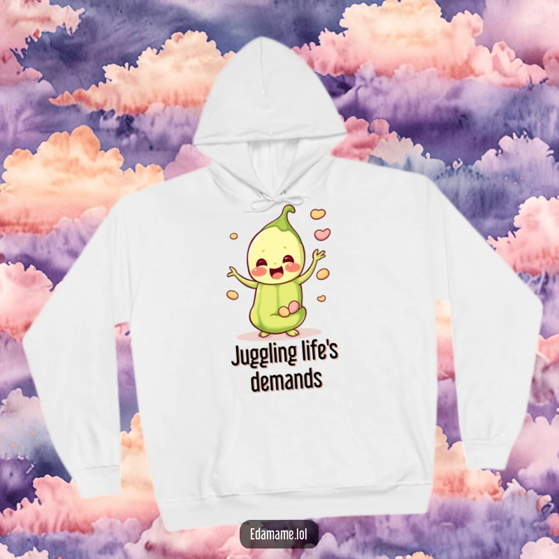 Funny hoodie featuring a happy edamame pod expertly juggling smaller beans, providing cozy comfort and cheerful vibes.