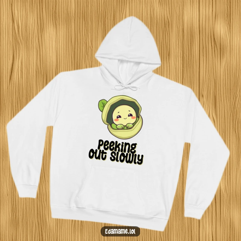 Funny hoodie designed with a shy edamame bean peeking from a pod, offering warmth and subtle humor.