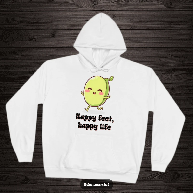 Funny smiling edamame pod with little legs happily skipping, featured on a cozy hoodie, bringing warmth and cheer.