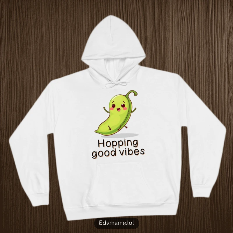 Funny hoodie featuring a cheerful bright green bean pod with tiny legs in a dynamic hopping pose, radiating fun.
