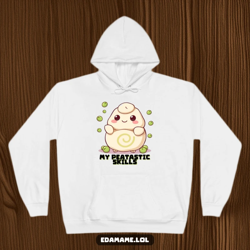 Funny hoodie showcasing a happy dumpling character with a swirl pattern, juggling peas, offering warmth and a dose of playful skill.