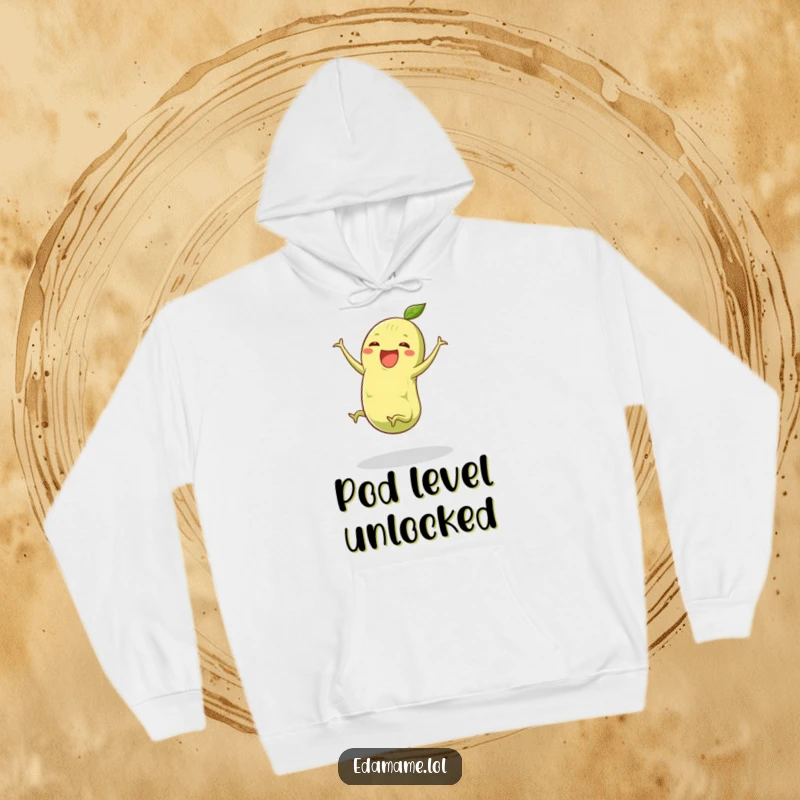 Funny edamame hoodie depicting a green pod with tiny legs performing a joyful cartwheel, offering warmth and a dose of playful humor.