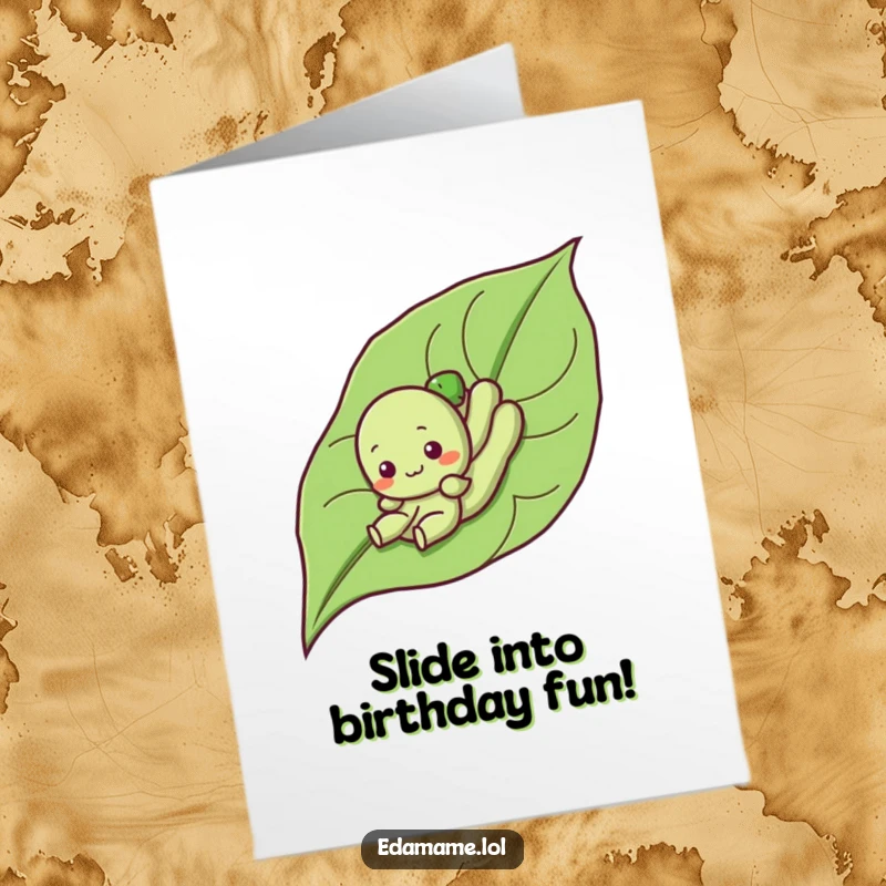 Funny Free Printable Birthday Card: A cute edamame character joyfully sliding down a large green leaf.